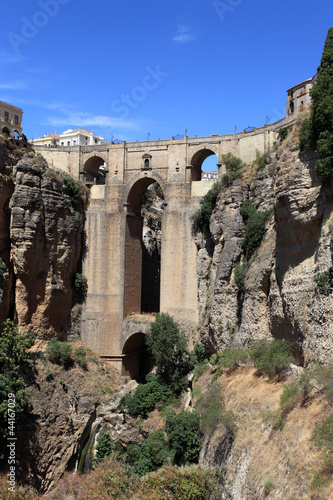 Photo: Famous bridge Puente Nuevo in Andalusia Spain Famous bridge Puente Nuevo in Andalusia Spain
