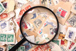 postage stamp and magnify glass
