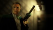 Secret agent with weapon