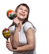 Happy smiling woman with maracas