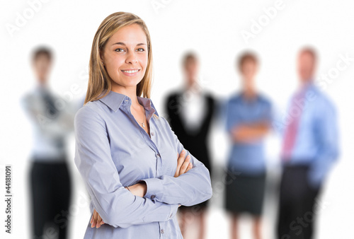 Photo: Woman in front of a group of people Woman in front of a group of people