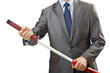 Foto: Businessman with sword on white Businessman with sword on white