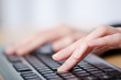 Photo: Hands typing on the keyboard Hands typing on the keyboard