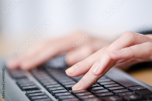 Photo: Hands typing on the keyboard Hands typing on the keyboard