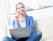 Photo: Pretty woman dreams about purchasing through the internet Pretty woman dreams about purchasing through the internet