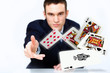 Photo: Young man showing poker cards Young man showing poker cards