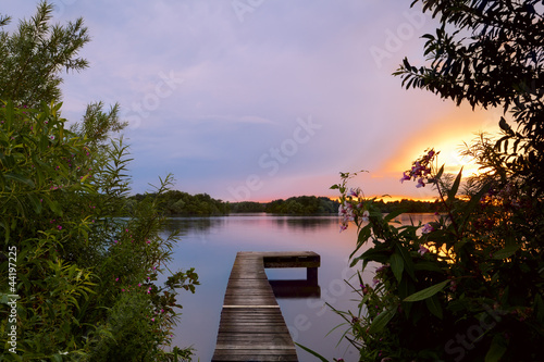 Photo: wooden pier at sunset wooden pier at sunset