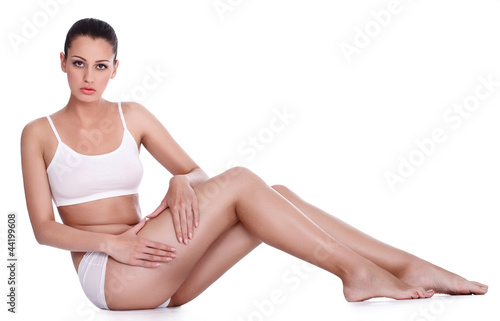 Photo: Young woman showing cellulite Young woman showing cellulite