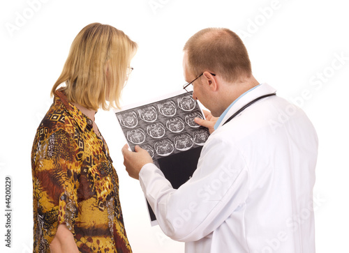 Photo: Medical doctor examining a patient Medical doctor examining a patient