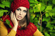 Fashion portrait of young sensual woman in garden