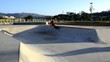 Skateboarder riding a pool
