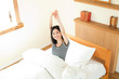 Beautiful young woman relaxing in the room