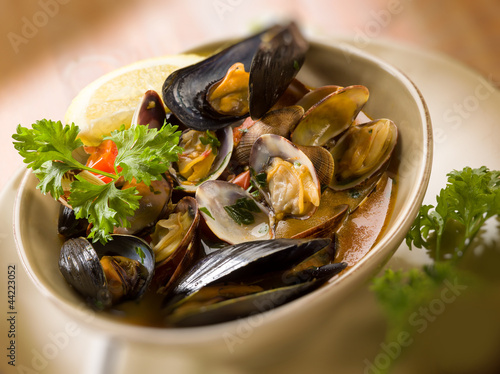 Photo: mussel and clam soup, selective focus mussel and clam soup, selective focus