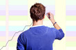 Young man stands chart on the board