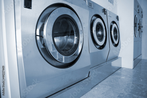 Photo: industrial washing machines in Commercial Laundromat industrial washing machines in Commercial Laundromat