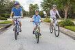 Photo: Young Family Parents and Boy Son Cycling Young Family Parents and Boy Son Cycling