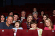 Foto: Family Watching Film In Cinema Family Watching Film In Cinema