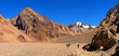 Mountain panorama with hikers trekking in Andes, South America