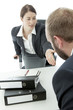Photo: beard business man brunette woman at desk ask to sit down beard business man brunette woman at desk ask to sit down