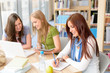 Photo: Group of students sitting at study room Group of students sitting at study room