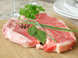 Raw Steak with  Herbs on the Wooden Board