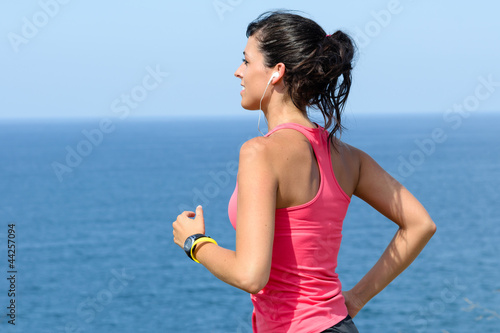 Photo: Female runner and sea Female runner and sea