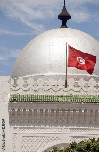 Photo: landmark large silver dome mosque and flag Sousse Tunisia Africa landmark large silver dome mosque and flag Sousse Tunisia Africa