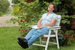 woman reading a book in the garden