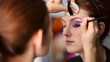 Model making-up for photography in studio.