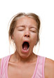 A girl who is sweet yawns