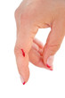 Finger with a bloody cuts
