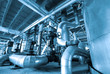 Equipment, cables and piping as found inside of  industrial powe
