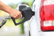 Pumping gas at gas pump