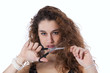 Woman cutting her hair