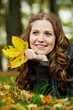 Woman at autumn outdoors