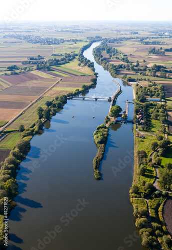 Photo: aerial view of Odra river canal lock near Opole city aerial view of Odra river canal lock near Opole city