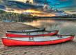 Photo: Three Canoes Alongside A Lake Three Canoes Alongside A Lake