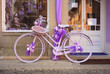 Purple bike next to a lavender shop