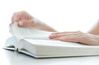 Young female reading a big book