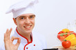 Young cook preparing food