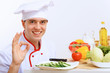 Young cook preparing food