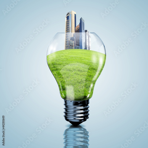Photo: Electric light bulb and planet inside it Electric light bulb and planet inside it