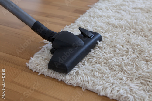 Photo: Teppich mit Staubsauger Teppich mit Staubsauger