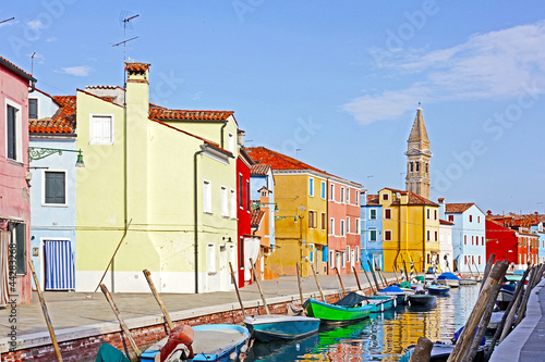 Photo: Venice, Burano island canal, small colored houses and the boats Venice, Burano island canal, small colored houses and the boats