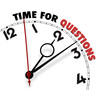 Photo: White clock with words Time for Questions on its face White clock with words Time for Questions on its face