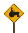 Yellow farm tractor sign
