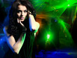 Foto: Beautiful young woman dancing in the nightclub Beautiful young woman dancing in the nightclub