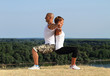 Photo: Couple practising yoga Couple practising yoga