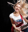 Woman Playing the Guitar