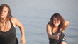 Video: Team of beautiful girls dancing at the beach Team of beautiful girls dancing at the beach